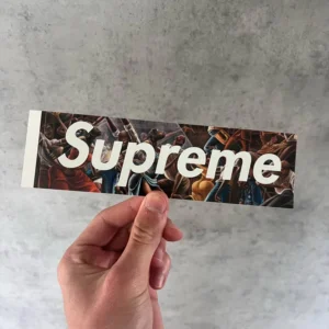 Supreme Ernie Barnes Box Logo Sticker – naklejka z grafiką inspirowaną malarstwem Erniego Barnesa.